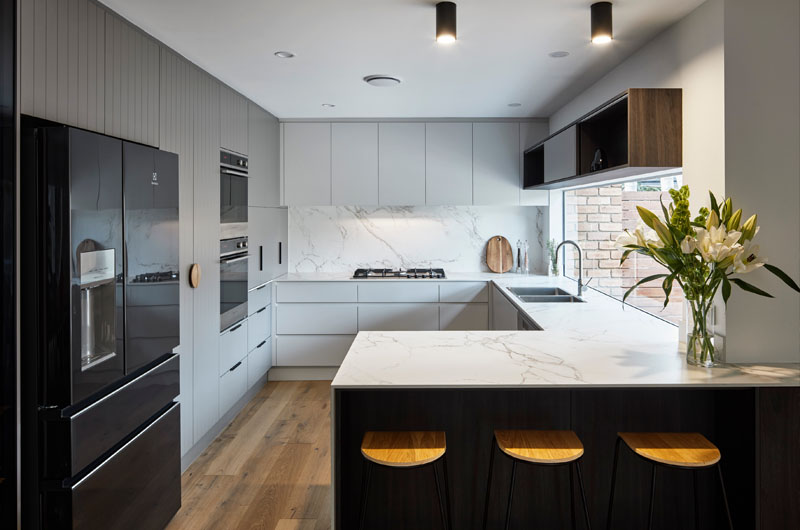 Modern kitchen remodel in Centurion with custom island and sleek finishes.