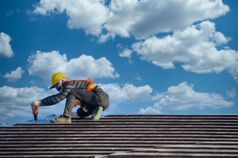 Professional roofing team completing a tile roof repair in Gauteng